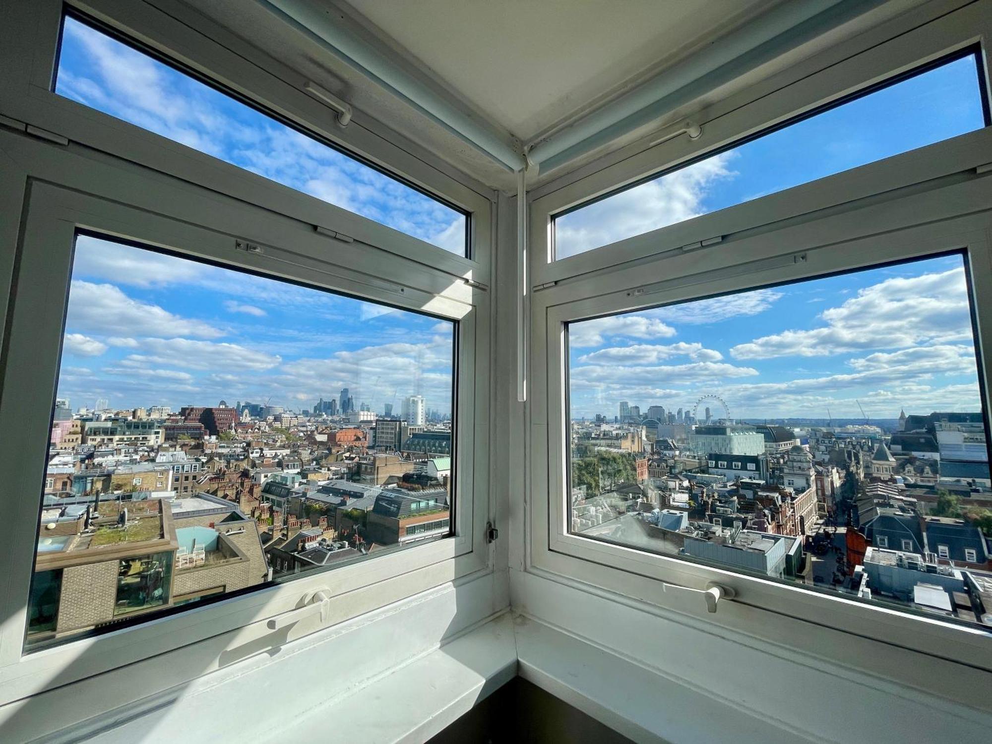 Apartament Bright 2-bedroom In Soho High-rise With Skyline Views